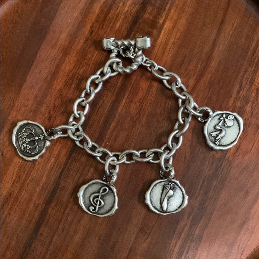 Silver tone charm bracelet